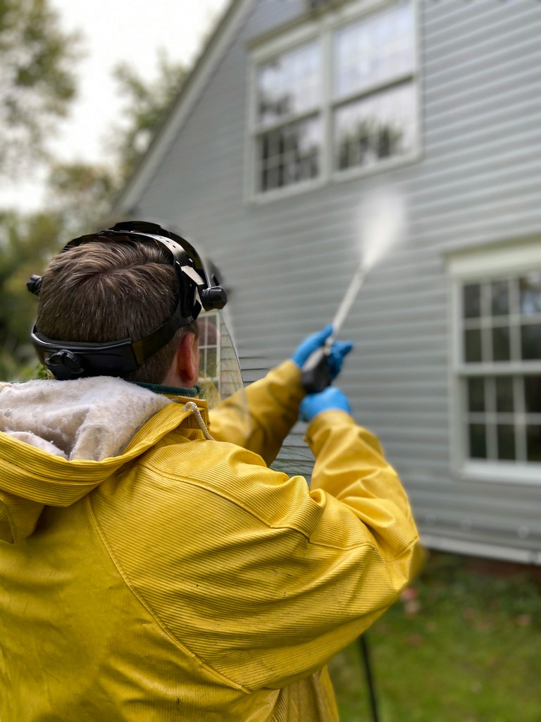Roof cleaning and exterior soft washing